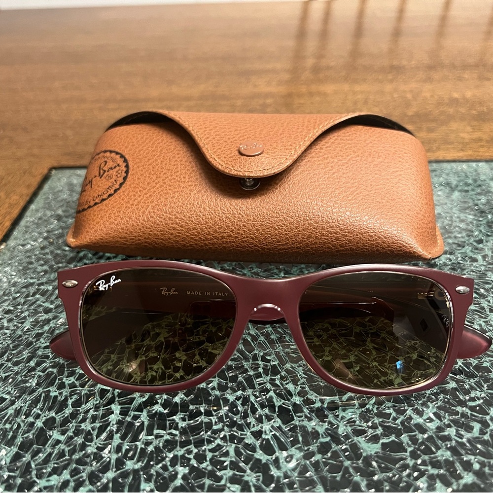 RayBan New Wayfarer sunglasses with case.